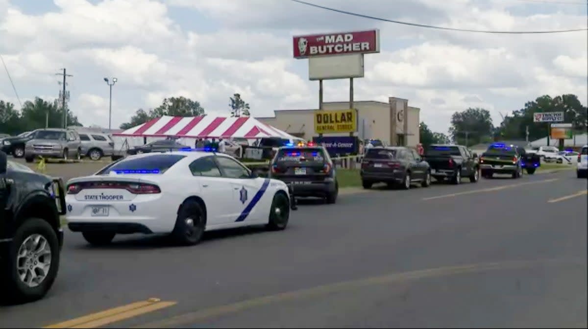 Police respond to the scene of a shooting in Arkansas  (AP)