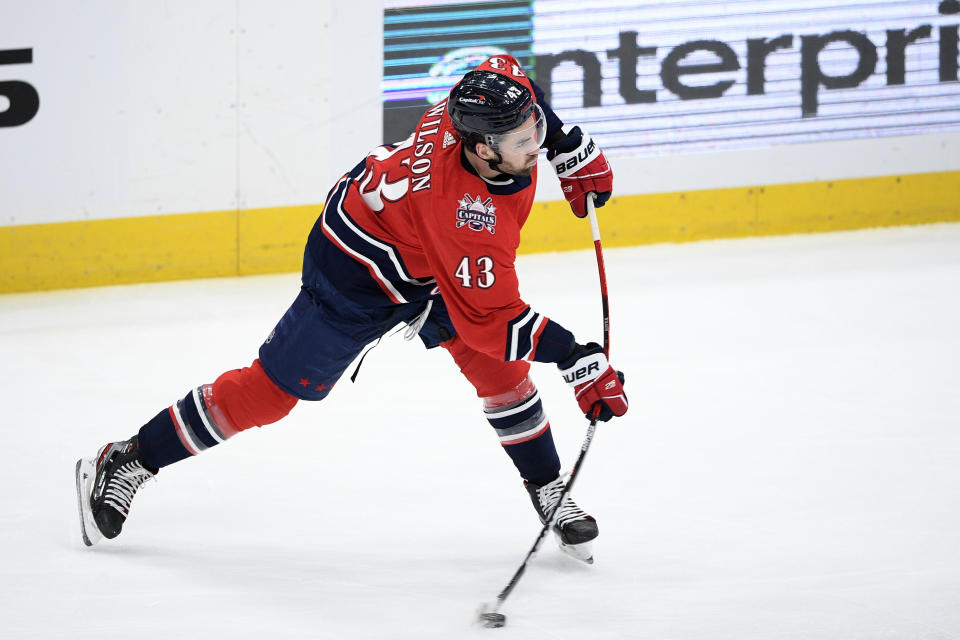 Washington Capitals right wing Tom Wilson shoots during the second period of the team's NHL hockey game against the New York Rangers, Saturday, March 20, 2021, in Washington. (AP Photo/Nick Wass)