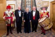 <p>The Duchess of Cornwall wore a dark blue velvet gown with embroidered detailing to a dinner for the English and Welsh wine industry at Vintners Hall. </p>