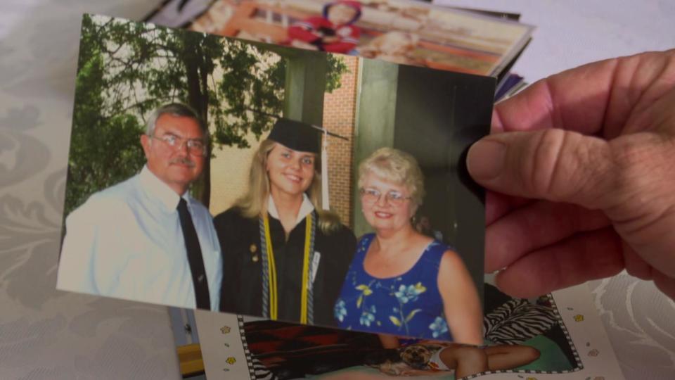 Lori and her parents on her graduation day. / Credit: CBS News/Arlene Slesinski