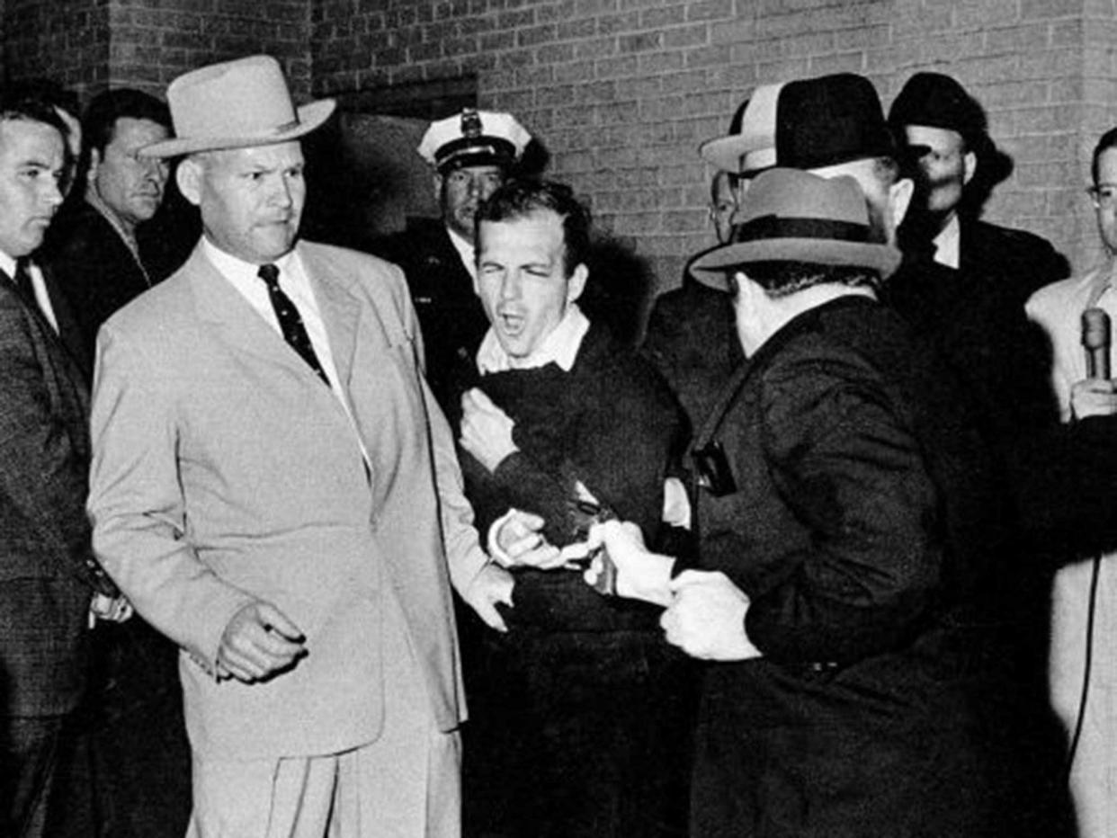 Jack Ruby shoots Lee Harvey Oswald in the basement of the Dallas police headquarters: AP