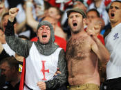 KIEV, UKRAINE - JUNE 15: England fans celebrate during the UEFA EURO 2012 group D match between Sweden and England at The Olympic Stadium on June 15, 2012 in Kiev, Ukraine. (Photo by Christopher Lee/Getty Images)