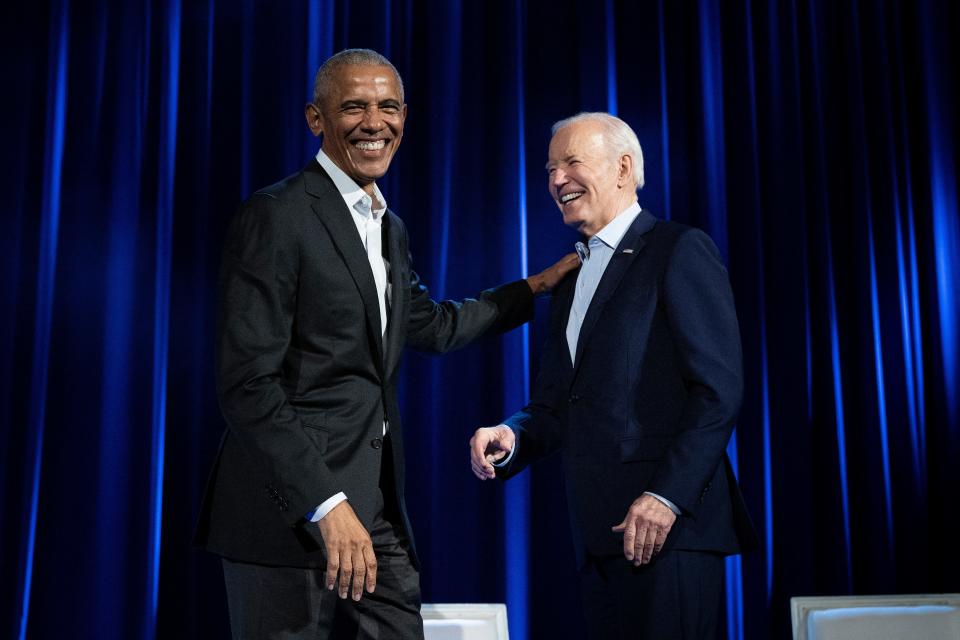 Former President Barack Obama (L) and US President Joe Biden arrive for a campaign fundraising event at Radio City Music Hall in New York City on March 28, 2024.