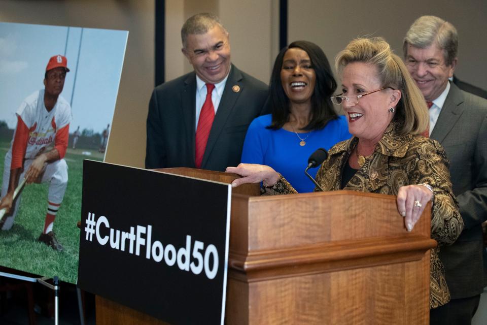 Rep. William Lacy Clay, D-Mo., left, and Judy Pace Flood, stand with Sen. Roy Blunt, R-Mo., right, as Rep. Ann Wagner, R-Mo., speaks during a news conference in 2020 as they call for the late Curt Flood to be inducted into the Baseball Hall of Fame.