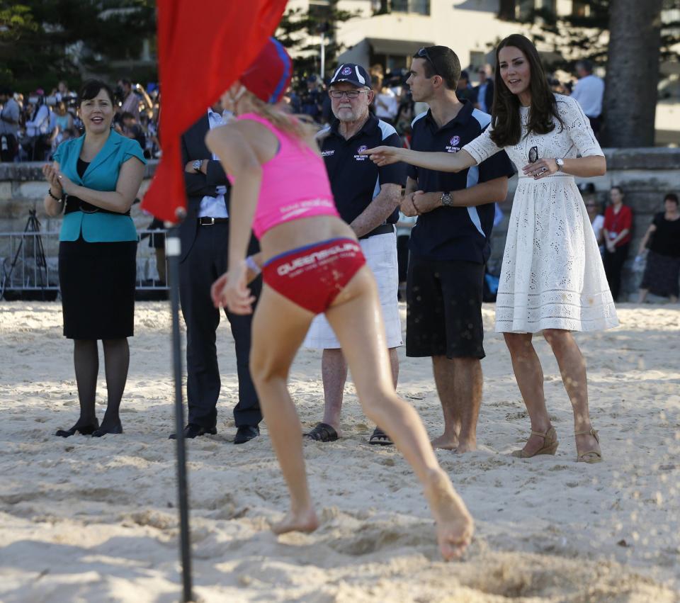 Catherine, the Duchess of Cambridge, talks to junior surf lifesavers during a visit to Sydney's Manly beach