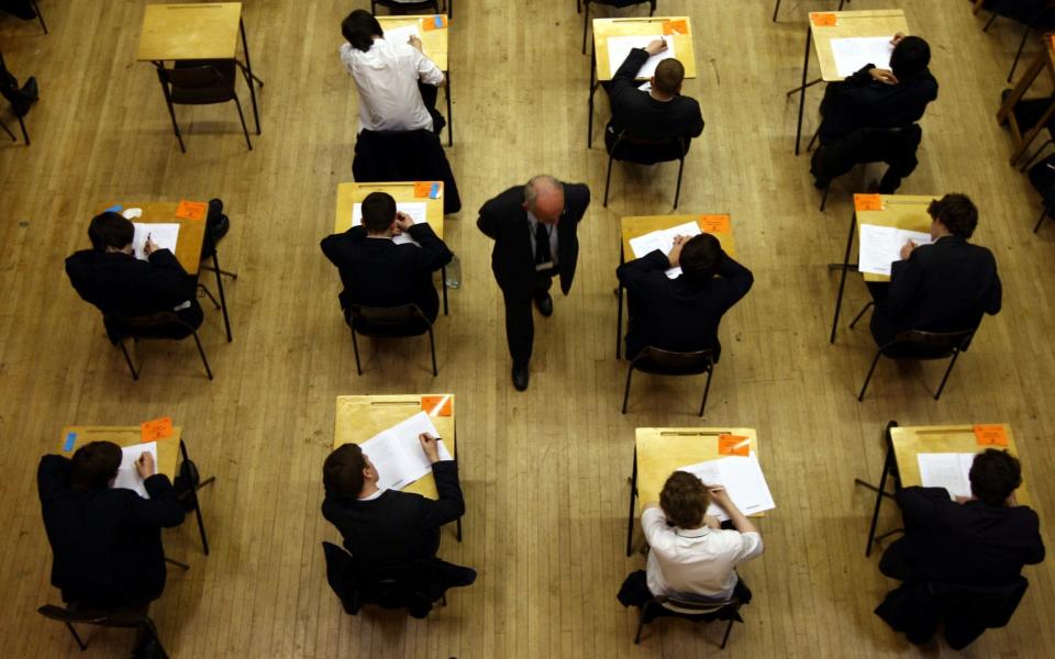 a general view of pupils sitting an exam. The Government should consider holding rigorous "backup" assessments rather than mock exams in case next year's GCSE and A-level exams are cancelled amid the pandemic, a think tank has suggested - PA