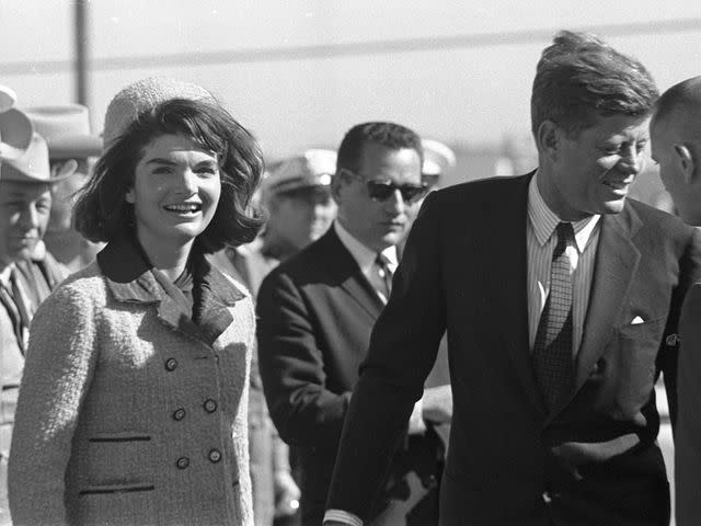 Fort Worth Star-Telegram Collect Jackie and John Kennedy in Dallas on Nov. 22, 1963. Secret Service Agent Clint Hill stands centered in the background