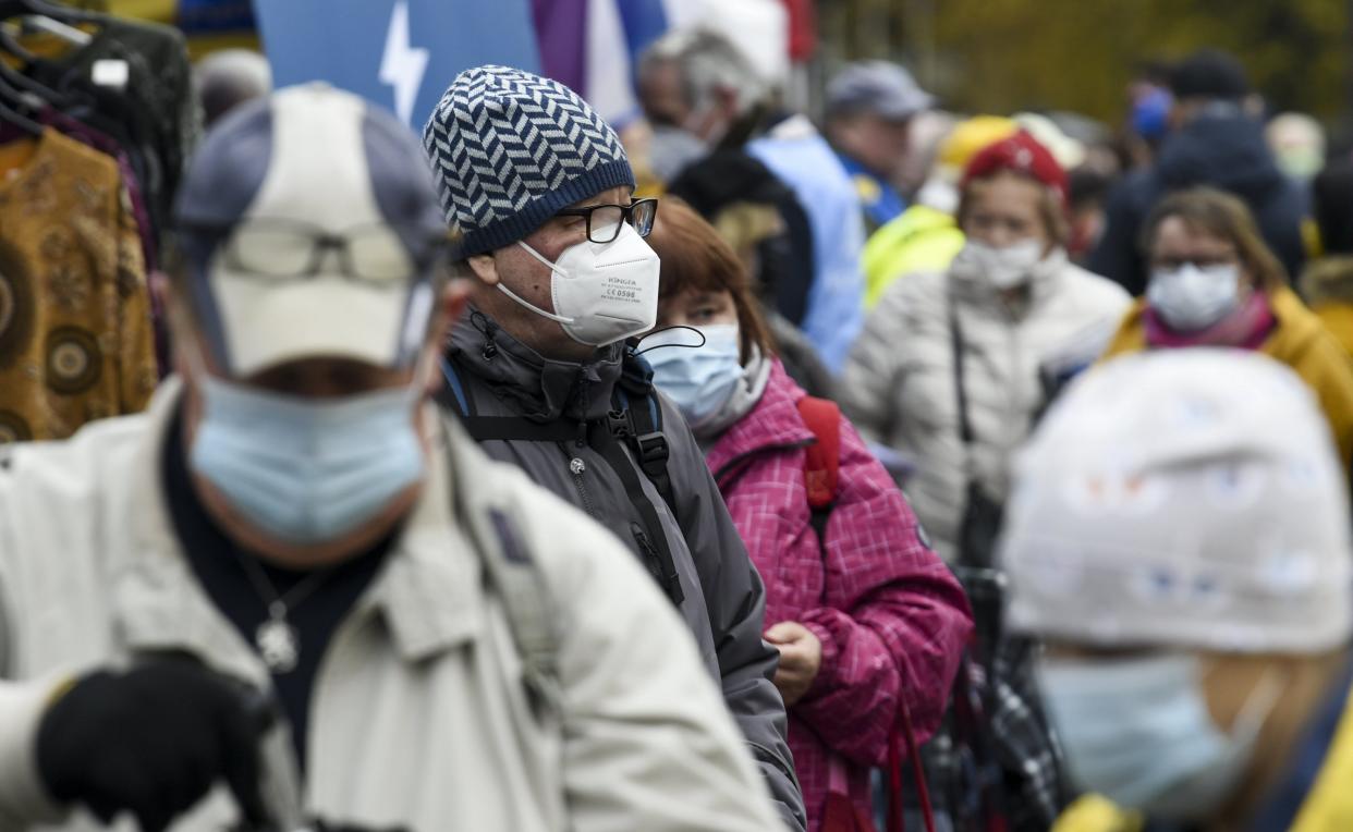 People wear face masks at the Hakaniemi Sunday market in Helsinki, Finland, on November 1, 2020, amid the novel coronavirus COVID-19 pandemic. - Finland has now 16 291 confirmed cases of Covid-19 with 358 fatalities. (Photo by Markku Ulander / Lehtikuva / AFP) / Finland OUT (Photo by MARKKU ULANDER/Lehtikuva/AFP via Getty Images)