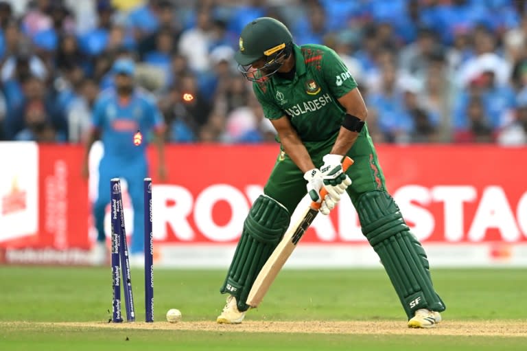 Clean bowled - Bangladesh's Mahmudullah is dismissed during the Tigers' lowly 256-8 against India in Pune (Punit PARANJPE)