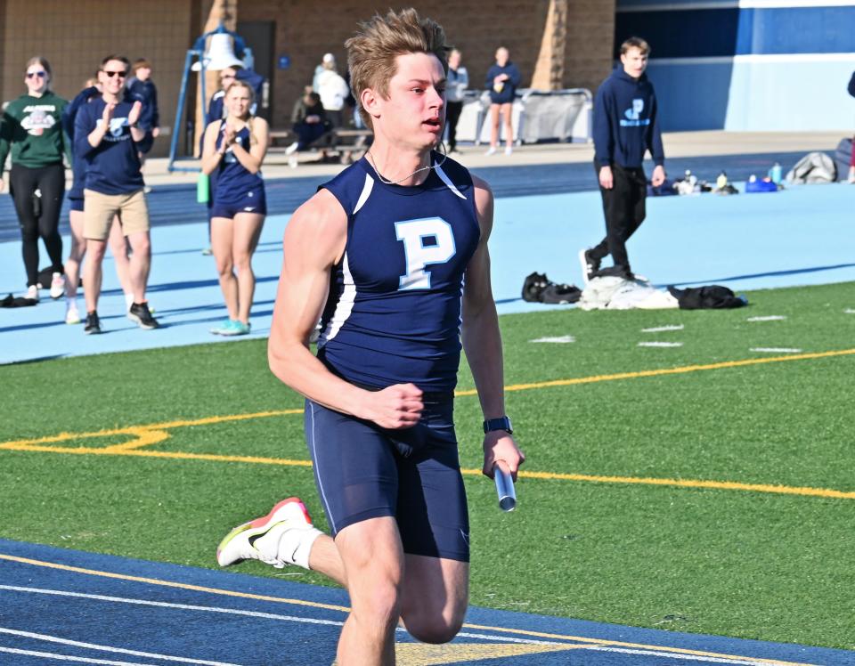 Petoskey's Sam Mitas became the first-ever track athlete to run below an 11 second 100 meter dash recently, setting a new school record with a 10.95, part of a three-record day in Traverse City.