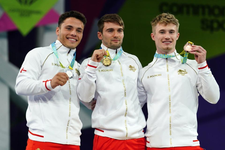 (Left to right) England’s Jordan Houlden, Daniel Goodfellow and Jack Laugher on the podium during the medal ceremony for the men’s 3m springboard final (David Davies/PA) (PA Wire)