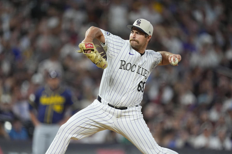 Colorado Rockies relief pitcher Jalen Beeks works against the Milwaukee Brewers in the ninth inning of a baseball game Thursday, July 4, 2024, in Denver. (AP Photo/David Zalubowski)