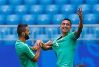 Soccer Football - World Cup - Australia Training - Samara Arena, Samara, Russia - June 20, 2018 Australia's Tim Cahill and Aziz Behich during training REUTERS/David Gray