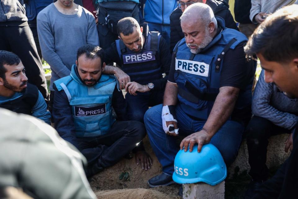 Wael al-Dahdouh buries his son, who was killed in an Israeli strike (Getty)