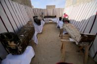 Coffins, part of a recent discovery from the Saqqara necropolis, are seen south of Cairo