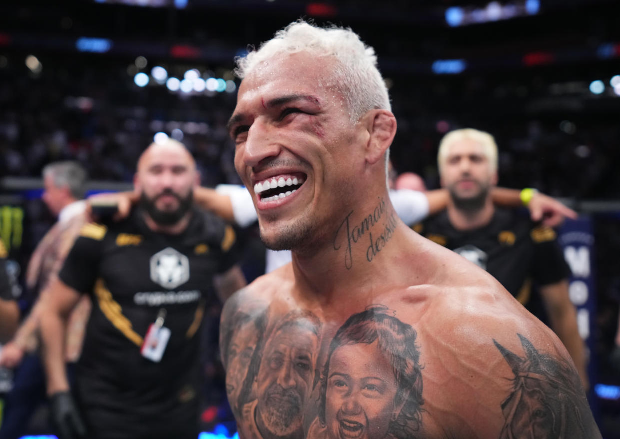 PHOENIX, ARIZONA - MAY 07: Charles Oliveira of Brazil reacts after his submission victory over Justin Gaethje in the UFC lightweight championship fight during the UFC 274 event at Footprint Center on May 07, 2022 in Phoenix, Arizona. (Photo by Chris Unger/Zuffa LLC)