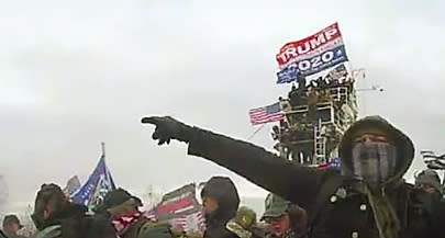 Brian Christopher Mock, right, at the Capitol on Jan. 6, 2021. (U.S. District Court for D.C.)