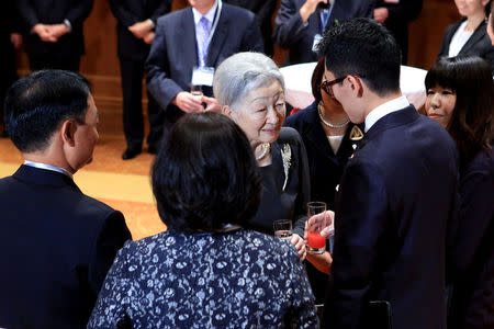 Japanese Empress Michiko (C) meets with Japanese community in Vietnam at a hotel in Hanoi, Vietnam, March 2, 2017. REUTERS/Minh Hoang/Pool