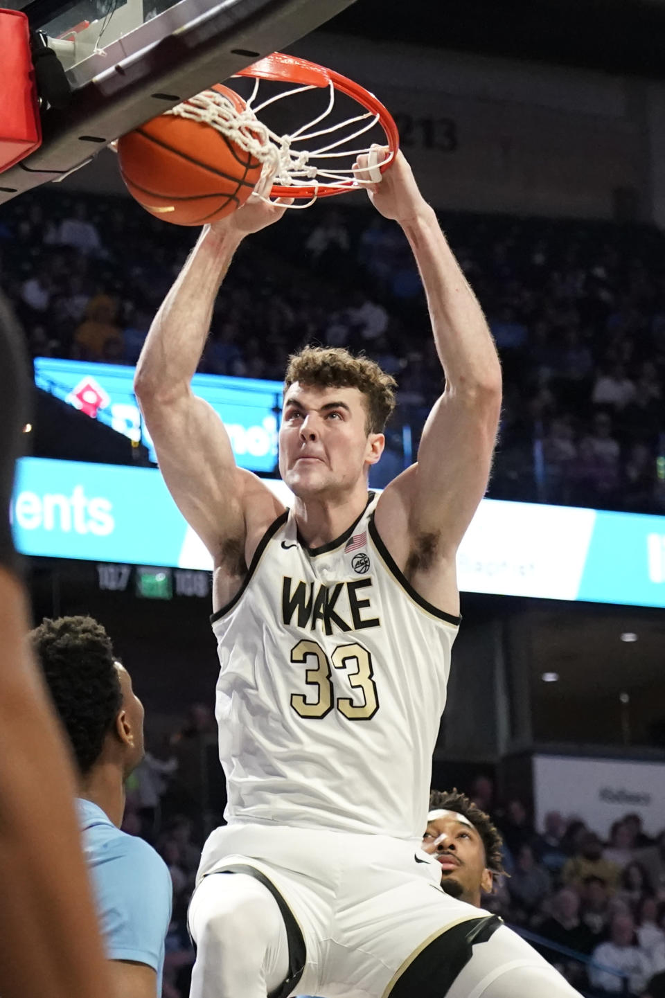 Wake Forest forward Matthew Marsh (33) dunks against North Carolina during the first half of an NCAA college basketball game in Winston-Salem, N.C., Tuesday, Feb. 7, 2023. (AP Photo/Chuck Burton)