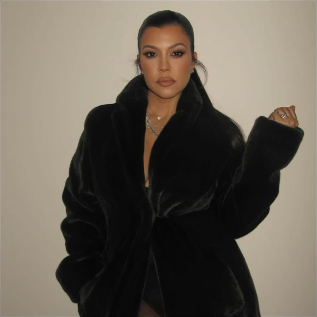  Kourtney Kardashian nailed postpartum fashion with just a coat. . 