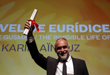 72nd Cannes Film Festival - Un Certain Regard prize - Cannes, France, May 24, 2019. Director Karim Ainouz celebrates winning the Grand Prix Un Certain Regard Award for the film "The Invisible Life of Euridice Gusmao" (A Vida Invisivel de Euridice Gusmao).