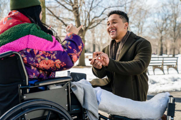 Nora (Awkwafina) in her dream coat with Daniel (Jaboukie Young-White).<p>Photo: Zach Dilgard/Courtesy of Comedy Central</p>