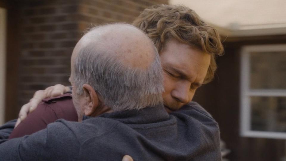 Peter Quill and his grandpa hug in Guardians of the Galaxy Vol. 3