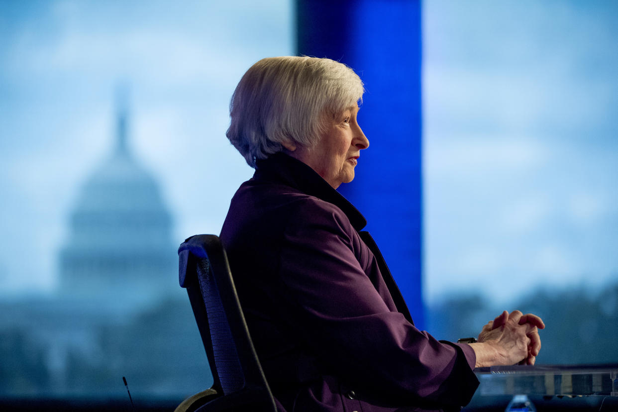 The Capitol Dome is visible in the window behind former Fed Chair Janet Yellen as she appears for an interview with FOX Business Network guest anchor Jon Hilsenrath in the Fox Washington bureau, Wednesday, Aug. 14, 2019, in Washington. The interview will air this Friday at 9:30PM/ET on FOX Business Network's WSJ at Large with Gerry Baker. (AP Photo/Andrew Harnik)