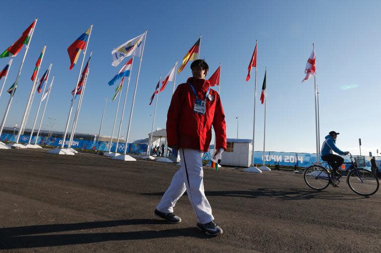 Philippine athlete Michael Christian Martinez arrives for the welcoming ceremony for the team in the Athletes Village at the Olympic Park ahead of the 2014 Winter Olympic Games in Sochi on February 2, 2014