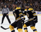 BOSTON, MA - JANUARY 07: Tyler Seguin #19 and Johnny Boychuk #55 of the Boston Bruins celebrate teammate Brad Marchand's goal in the first period against the Vancouver Canucks on January 7, 2012 at TD Garden in Boston, Massachusetts. (Photo by Elsa/Getty Images)