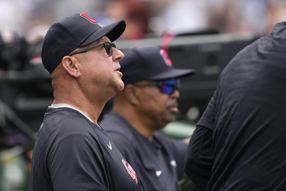 Cleveland Guardians manager Terry Francona looks out from the dugout after pulling starting pitcher Cal Quantrill in the the fourth inning of a baseball game against the Chicago Cubs Friday, June 30, 2023, in Chicago. (AP Photo/Charles Rex Arbogast)