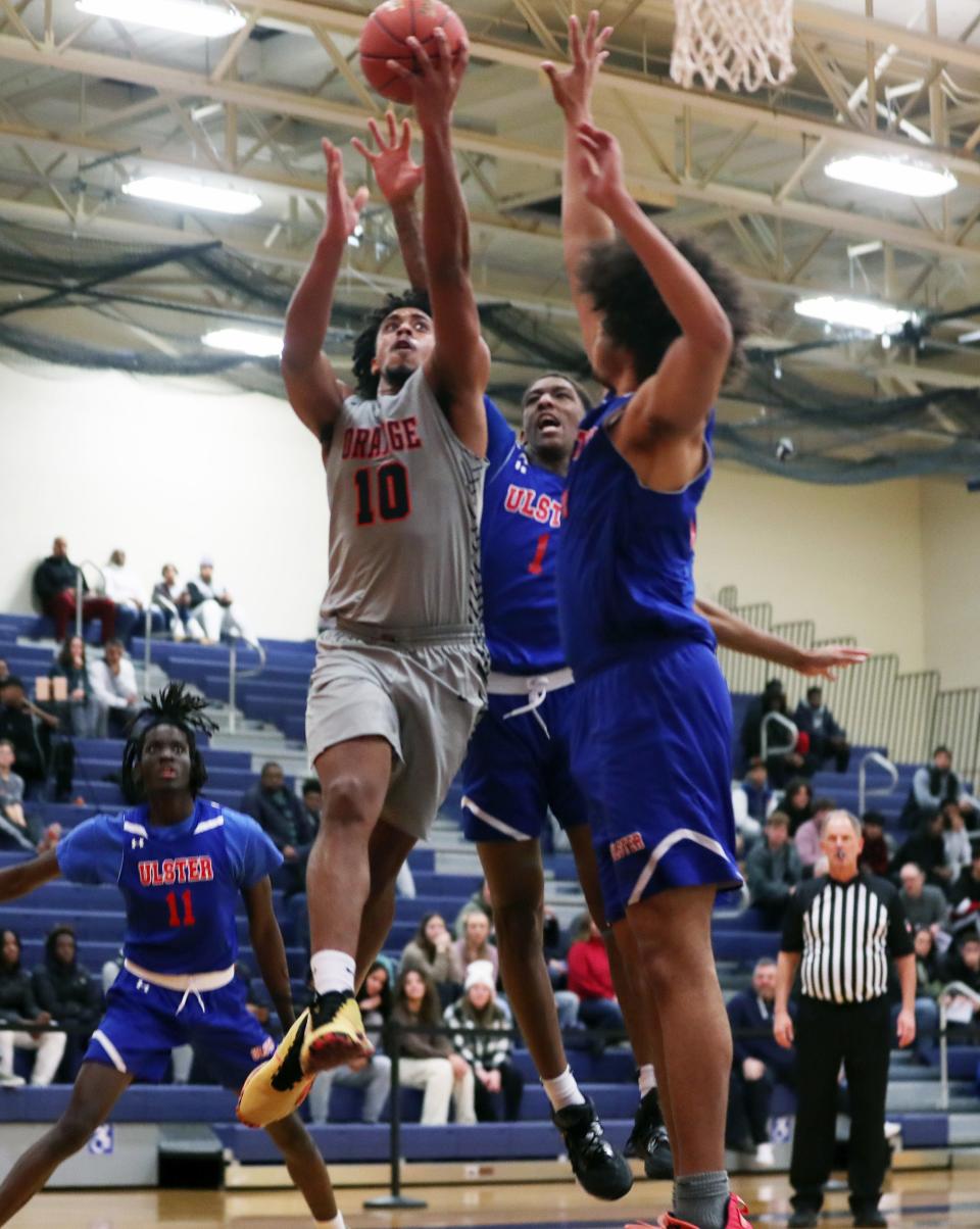 SUNY Orange Colts' Romeo Aquino (10) drives to the basket against the Ulster Senators during Junior College basketball action at SUNY Orange in Middletown Nov. 29, 2022. SUNY Orange won the game 123-59.