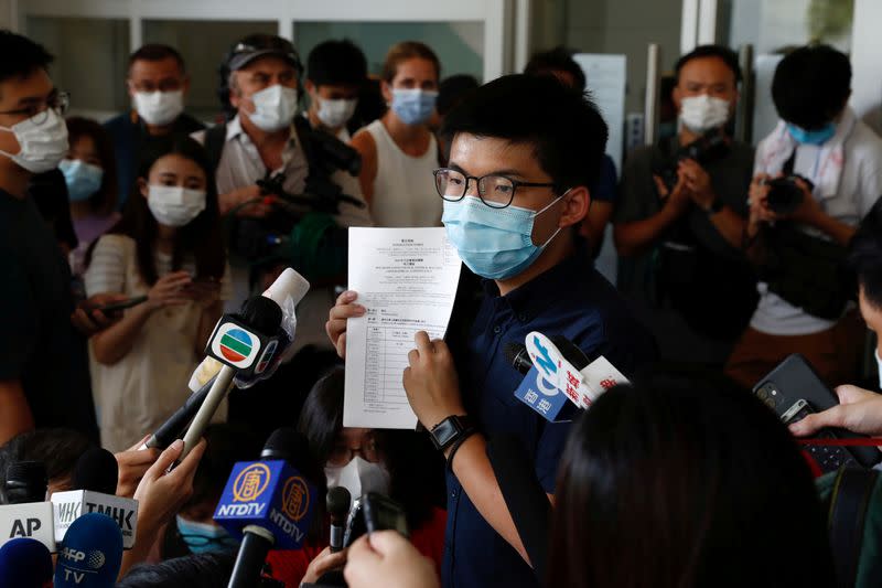 Pro-democracy activist Joshua Wong registers as a candidate for the upcoming Legislative Council election in Hong Kong