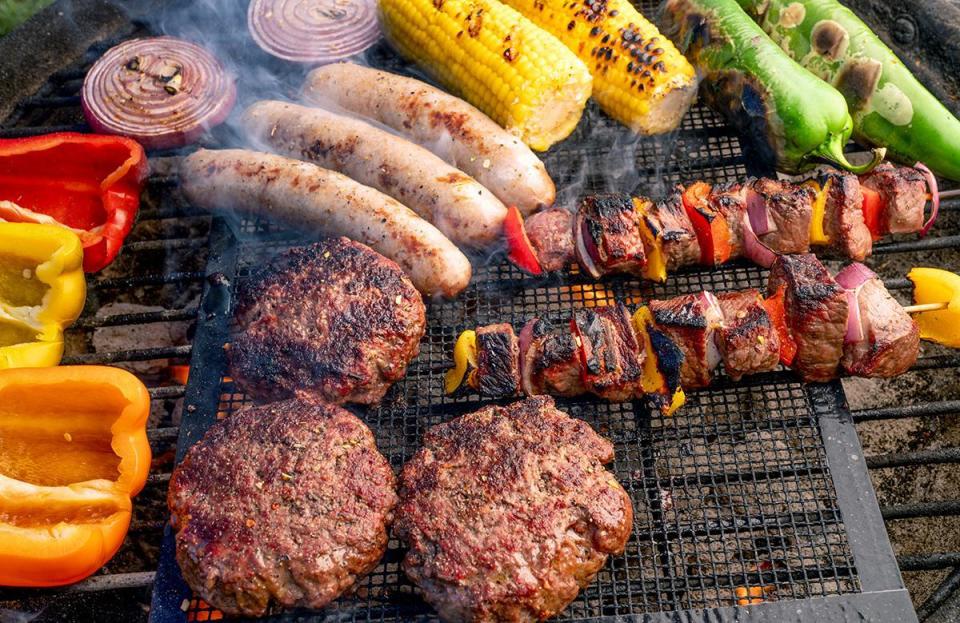 <p>While you may be tempted to grill a skewer of meat and vegetables or cook your onions at the same time as your burgers, doing so can risk cross-contamination and <a href="https://www.thedailymeal.com/healthy-eating/tips-avoiding-food-poisoning-gallery?referrer=yahoo&category=beauty_food&include_utm=1&utm_medium=referral&utm_source=yahoo&utm_campaign=feed" rel="nofollow noopener" target="_blank" data-ylk="slk:food poisoning;elm:context_link;itc:0;sec:content-canvas" class="link ">food poisoning</a>. It can also lead to an unevenly cooked meal, as vegetables tend to grill much faster.</p>