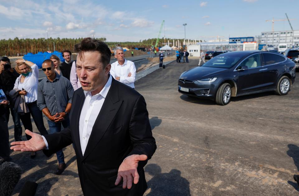 Tesla CEO Elon Musk talks to media as he arrives to visit the construction site for Tesla factory in Grünheide near Berlin, Germany in September 2020. Photo: Odd Andersen/AFP via Getty Images