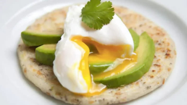 Arepas with egg and avocado