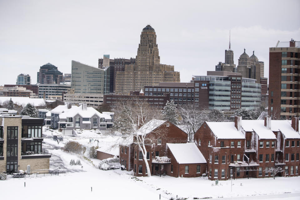 New snowfall blankets the city of Buffalo, N.Y., Friday, Nov. 18, 2022. (Libby March/The Buffalo News via AP)
