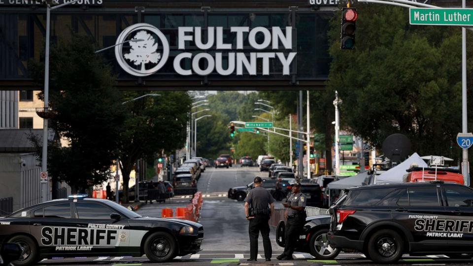 PHOTO: Fulton County Sheriff officers block off a street in front of the Fulton County Courthouse on Aug. 7, 2023 in Atlanta. (Joe Raedle/Getty Images)