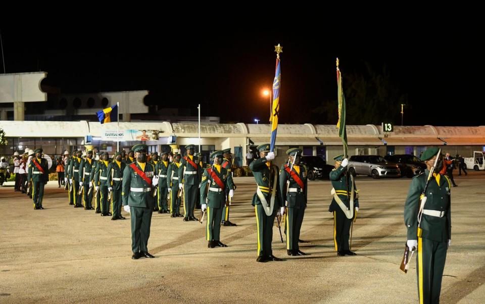 The Barbados Defence Force waiting for HRH Prince Charles, Prince of Wales arrival at Grantley Adams International Airport in Christ Church, Barbados, on November 28, 2021. (Photo by Randy Brooks / AFP) (Photo by RANDY BROOKS/AFP via Getty Images) - AFP