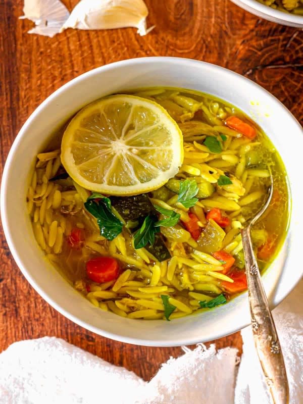 <p>Real Food with Sarah</p><p>This cozy soup is good for the soul.</p><p><strong>Get the recipe: </strong><a href="https://www.realfoodwithsarah.com/orzo-chicken-soup-with-bone-in-chicken-thighs/?fbclid=IwAR2aI9N3qLI9YgoxqDeTr2hEebfSB9UfTIxMcShquACiHiDuffich6TH6po" rel="nofollow noopener" target="_blank" data-ylk="slk:Orzo Chicken Soup with Bone-In Chicken Thighs;elm:context_link;itc:0;sec:content-canvas" class="link "><strong>Orzo Chicken Soup with Bone-In Chicken Thighs</strong></a></p>