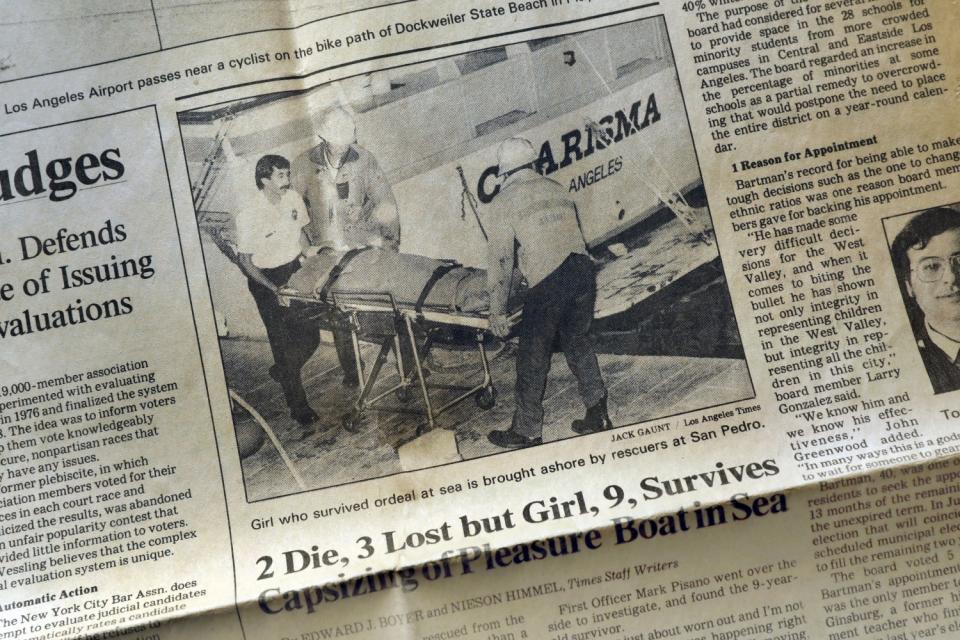 Newspaper clipping with photo of medics