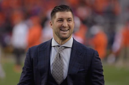 FILE PHOTO: Jan 7, 2019; Santa Clara, CA, USA; Former NFL player Tim Tebow on the field before the 2019 College Football Playoff Championship game between the Alabama Crimson Tide and the Clemson Tigers at Levi's Stadium. Mandatory Credit: Kirby Lee-USA TODAY Sports