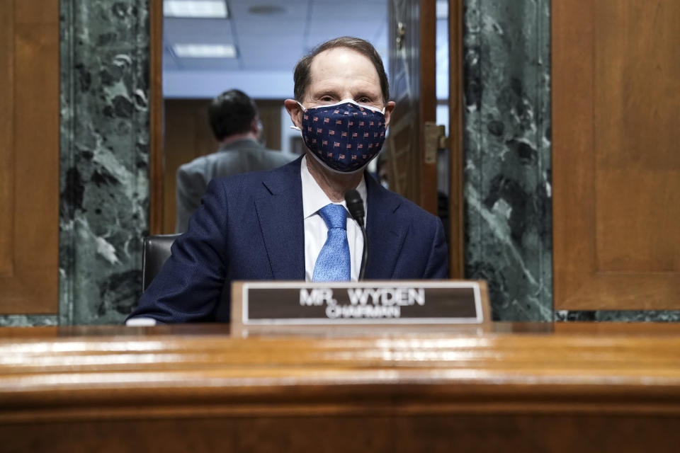 Senate Finance Committee Chairman Ron Wyden, D-Ore., listens during a nomination hearing for Deputy Treasury Secretary nominee Wally Adeyemo on Tuesday, Feb. 23, 2021 on Capitol Hill in Washington. (Greg Nash/Pool via AP)