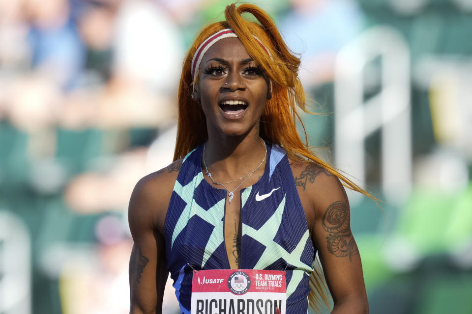 FILE - In this June 19, 2021, photo, Sha'Carri Richardson celebrates after winning the first heat of the semis finals in women's 100-meter run at the U.S. Olympic Track and Field Trials in Eugene, Ore. From doping, to demonstrations to dirty officials, the Olympics have never lacked their share of off-the-field scandals and controversies that keep the Games in the headlines long after the torch goes out. Only weeks before the start of the Olympics, the ban of American sprinter Richardson for a positive marijuana test fueled a debate about whether that drug — not considered a performance enhancer and now legal in some parts of the globe — should be forbidden anymore. (AP Photo/Ashley Landis, File)