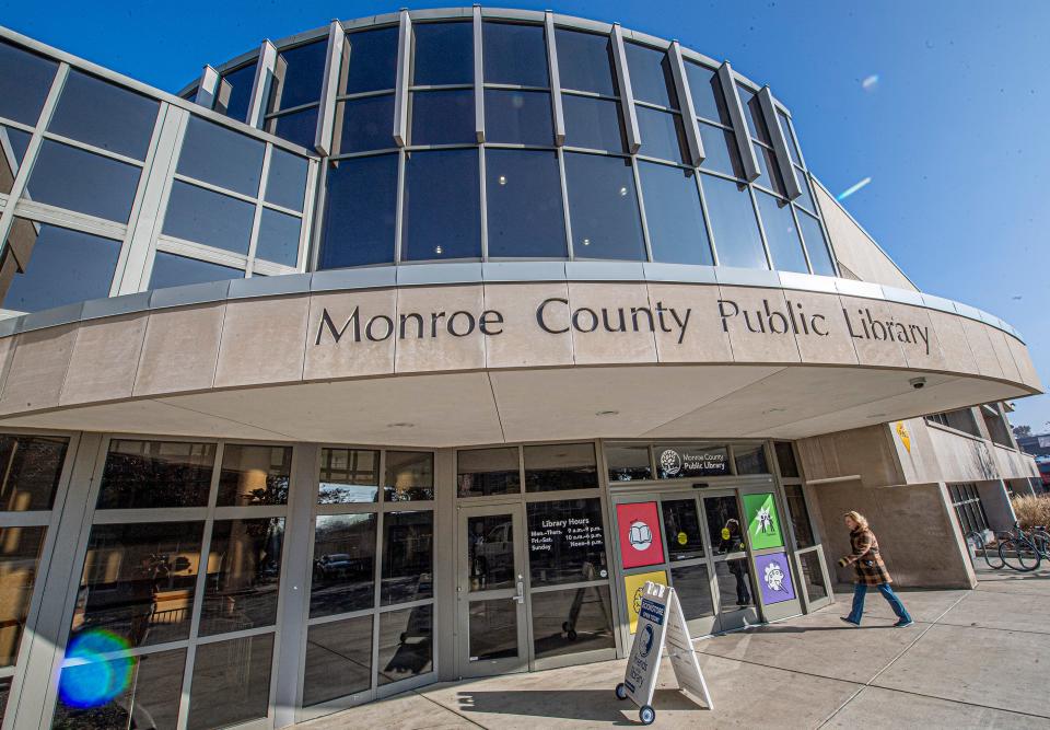 A patron heads into the Monroe County Public Library on East Kirkwood Avenue in downtown Bloomington.