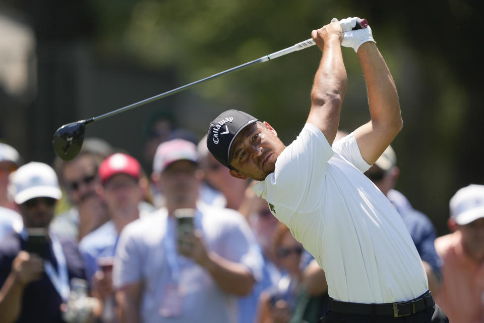 Xander Schauffele watches his tee shot on the ninth hole during the second round of the RBC Heritage golf tournament, Friday, April 19, 2024, in Hilton Head Island, S.C. (AP Photo/Chris Carlson)