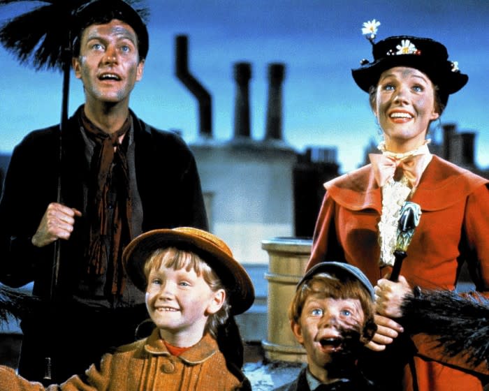 Dick Van Dyke as Bert, Julie Andrews as Mary Poppins, Karen Dotrice as Jane Banks and Matthew Garber as Michael Banks in "Mary Poppins" from 1964.