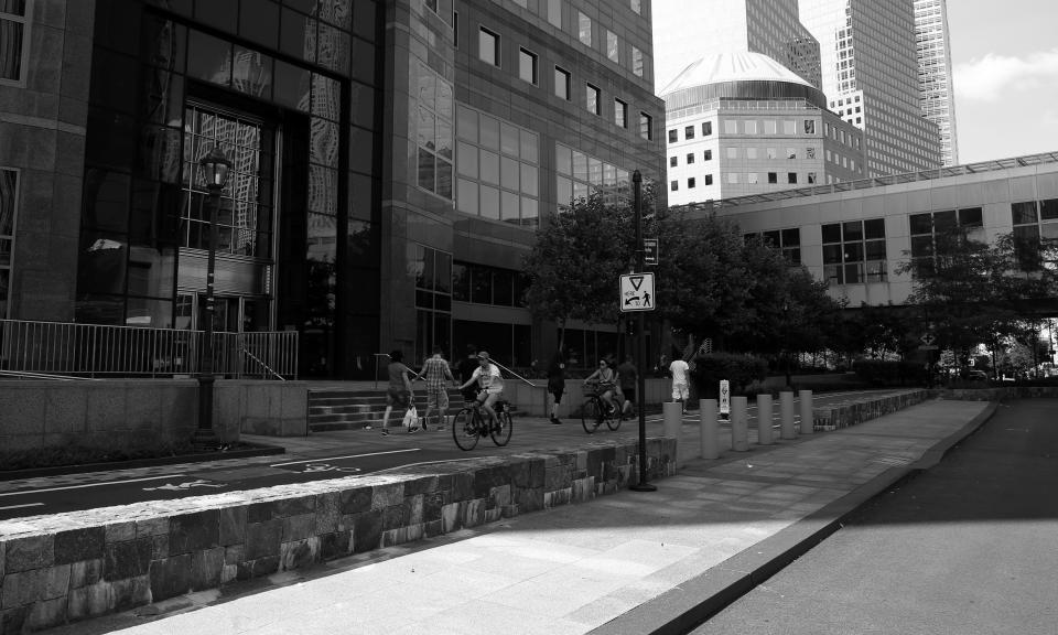 <p>People walk and ride their bikes down the Hudson River Greenway past Brookfield Place (originally known as the World Financial Center) on Aug. 20, 2017. (Photo: Gordon Donovan/Yahoo News) </p>