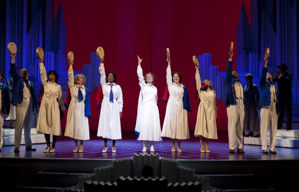 This theater image released by The Publicity Office shows Carolee Carmello, center, during a performance of the musical "Scandalous: The Life and Trials of Aimee Semple McPherson," at the Neil Simon Theatre in New York. (AP Photo/The Publicity Office, Jeremy Daniel)