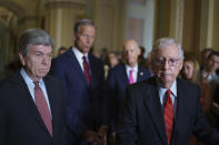 Sen. Roy Blunt, R-Mo., left, Senate Minority Leader Mitch McConnell, R-Ky., right, and the Republican leadership talk to reporters about progress on an infrastructure bill and voting rights legislation, at the Capitol in Washington, Tuesday, June 15, 2021. (AP Photo/J. Scott Applewhite)